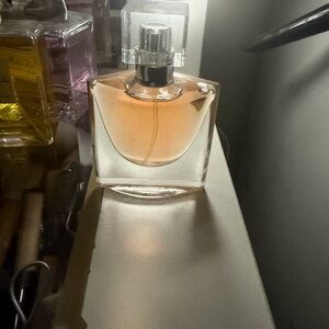 Elegant Perfume Bottle with Pink Hue